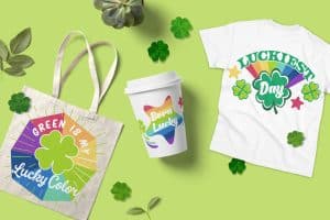 From above, a Saint Patrick's day table setting with a coffee paper cup, a white t-shirt and a tote bag, all with St. Patrick's Day illustrations